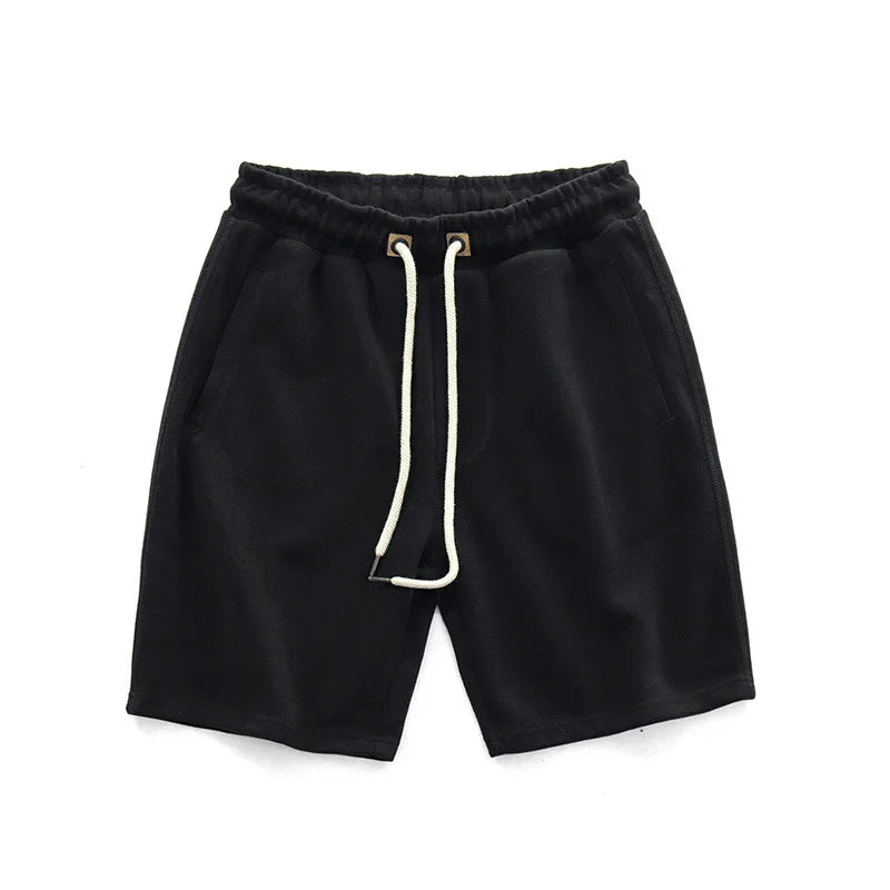 Comfortable men's Harlan performance shorts with drawstring. Ideal activewear for gym, sports & casual everyday style.