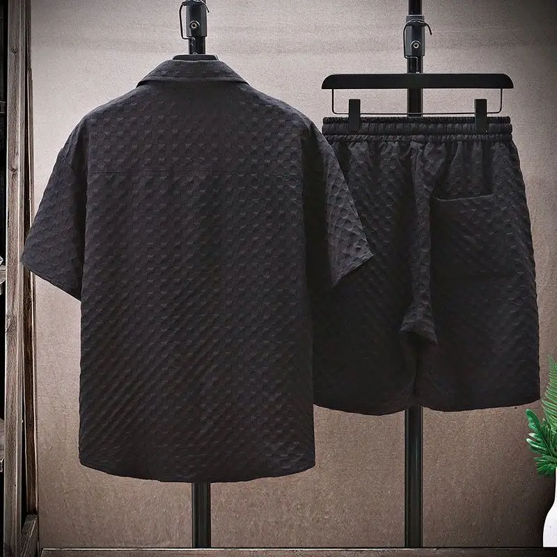 Men's casual two-piece summer set with a comfortable relaxed fit. Features breathable waffle texture, ideal for vacation.