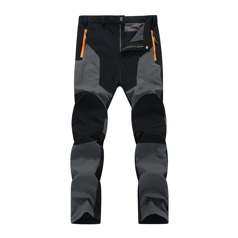 Insulated men's waterproof work pants, ideal for winter and all-weather outdoor jobs, offering warmth and durability.