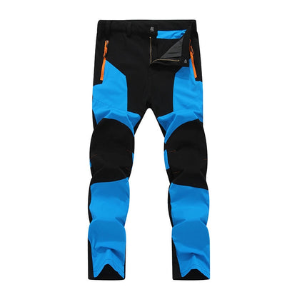 Utility men's movement pants, heavy-duty and waterproof, designed for active outdoor work, ensuring comfort and protection.