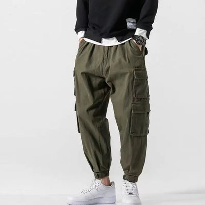Stylish men's cargo joggers, tapered fit, featuring multiple utility pockets, casual fashion.