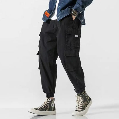 Men's athletic cargo joggers, heavyweight cotton, practical utility pockets, sleek tapered design.