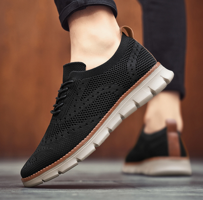 Side view: Men's lightweight brogue dress sneakers. Orthopedic comfort, ideal walking shoes.