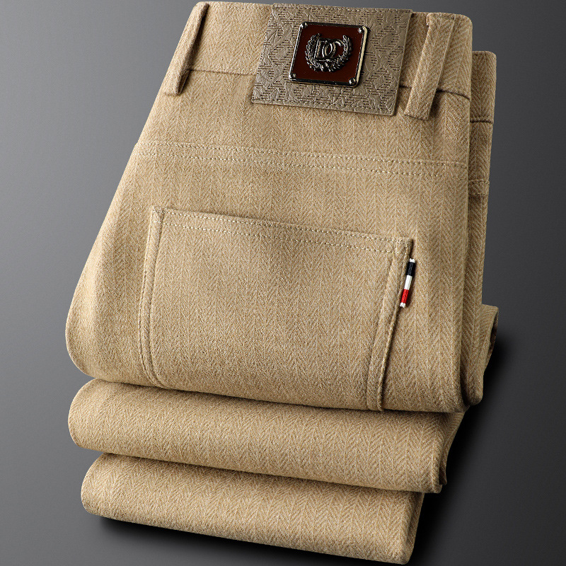 Detailed view of herringbone fabric on Men's Heritage Tailored Trousers, showcasing classic men's fashion.