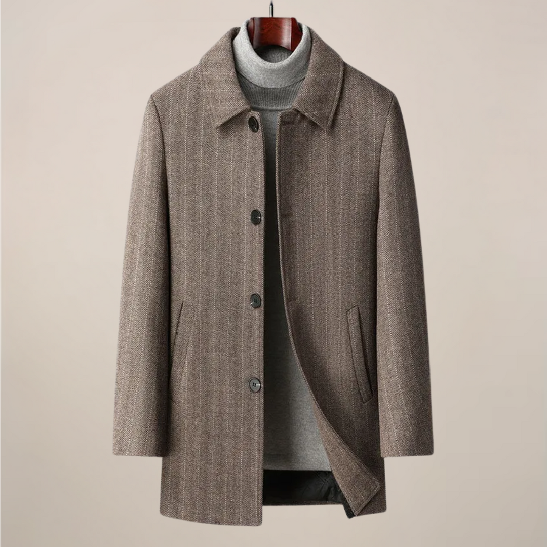 Detail of the button front and classic collar on a men's tailored herringbone car coat, elevating modern style.