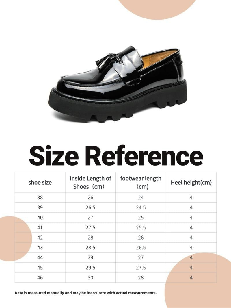 Polished men's high-shine black tassel loafers featuring a distinctive chunky sole for modern fashion footwear.