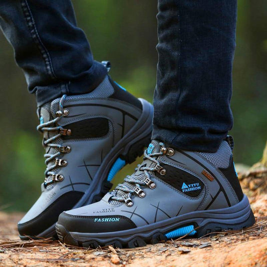 Men's high-top durable hiking boots for rugged outdoor trekking, lace-up design.
