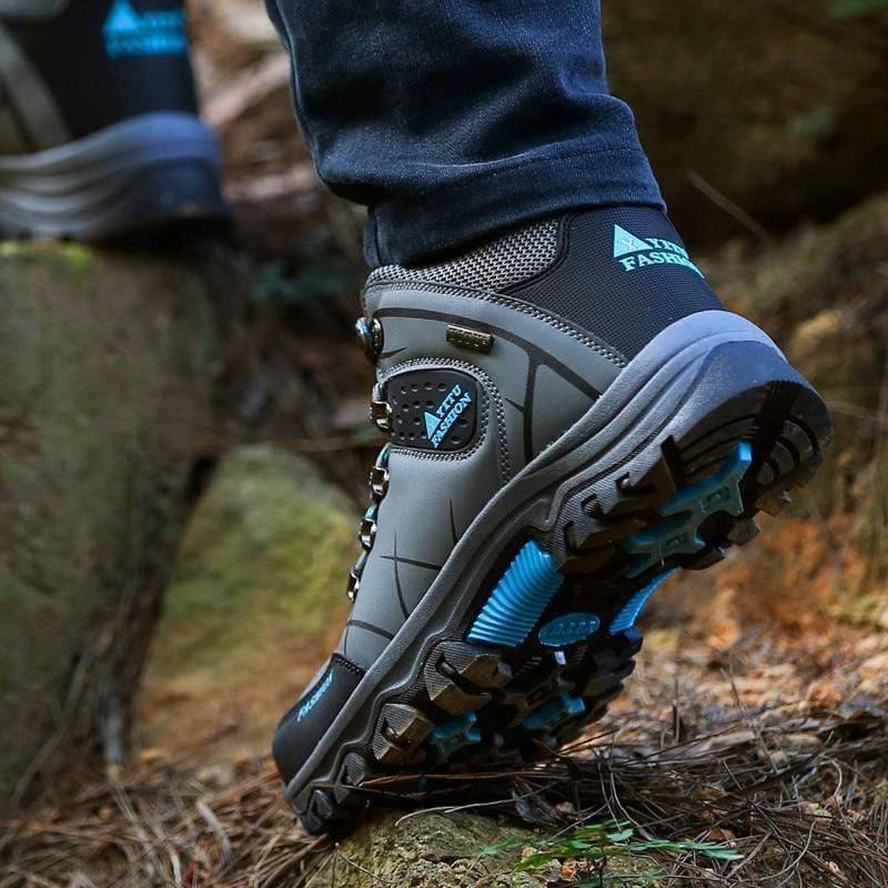Pair of men's casual high-top outdoor trekking boots, built for durability and comfort.