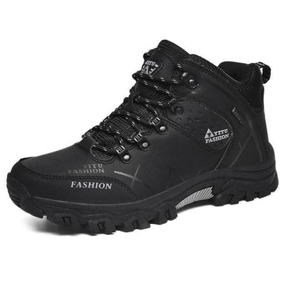 High-angle shot of men's durable high-top hiking boots, essential outdoor footwear for trekking.