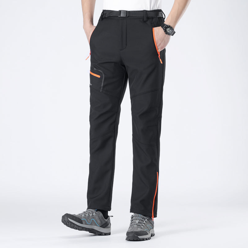 Close-up of durable fabric on men's insulated cold-weather trousers, water-resistant & warm.