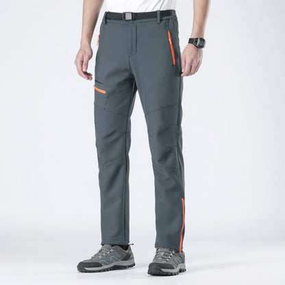 Men's adventure pants, insulated & wind-resistant for active cold weather outdoor use.