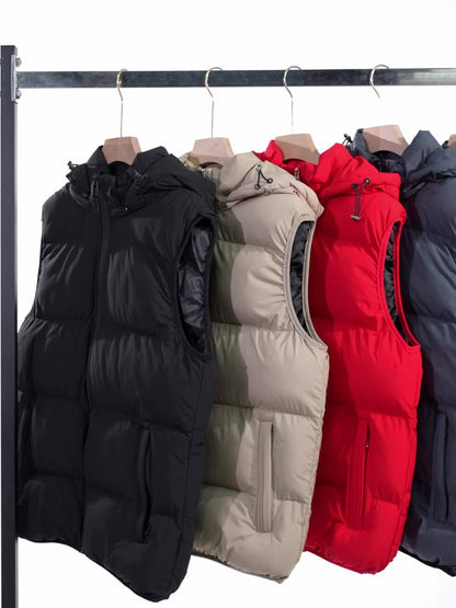 Modern men's hooded puffer vest, insulated and weather-resistant. Lightweight for stylish winter outdoor layering.