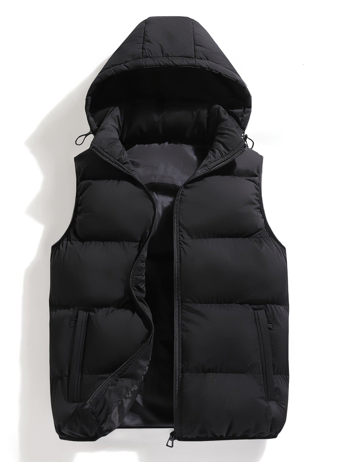 Multi-use men's hooded puffer vest. Insulated, weather-resistant, and lightweight for various winter layering needs.