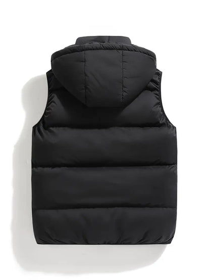 Comfortable men's insulated hooded puffer vest. Lightweight, weather-resistant, ideal for active winter outdoor layering.