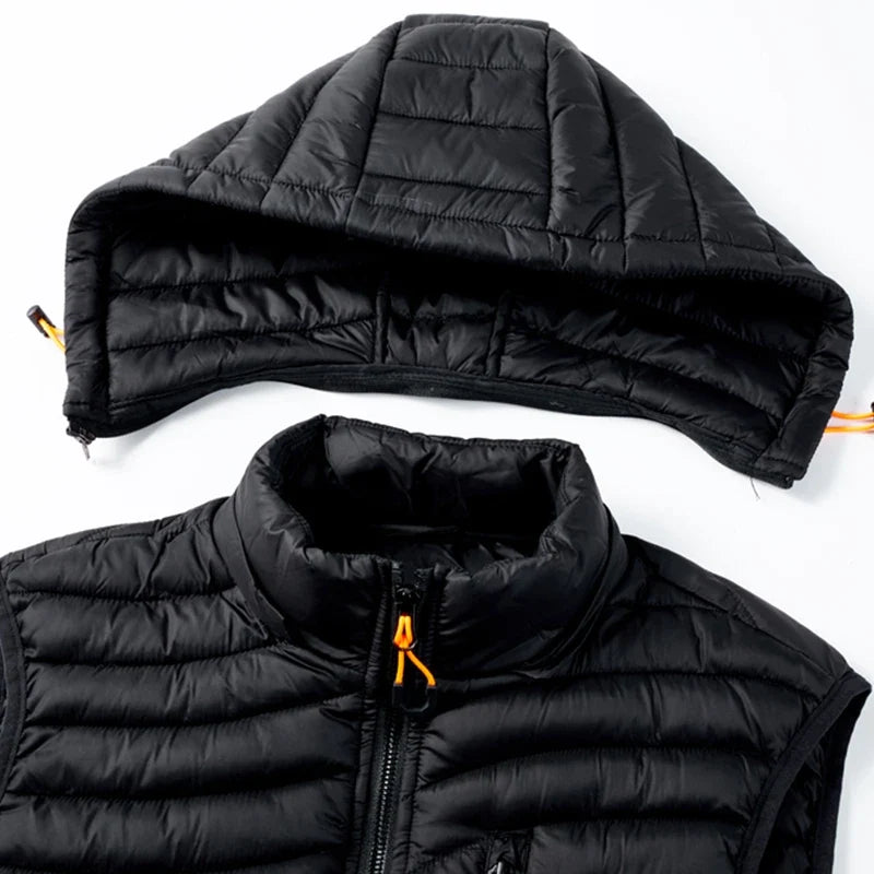 Sleeveless insulated puffer vest for men, designed for cold weather with a detachable hood and secure zip pockets.