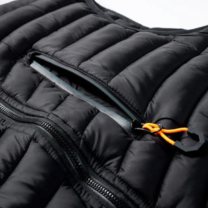 Comfortable men's puffer vest, insulated for warmth, featuring a detachable hood and lightweight design for ease.