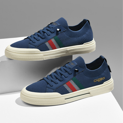 Close-up of black men's Italiana Style sneakers, featuring lace-up design for casual footwear.