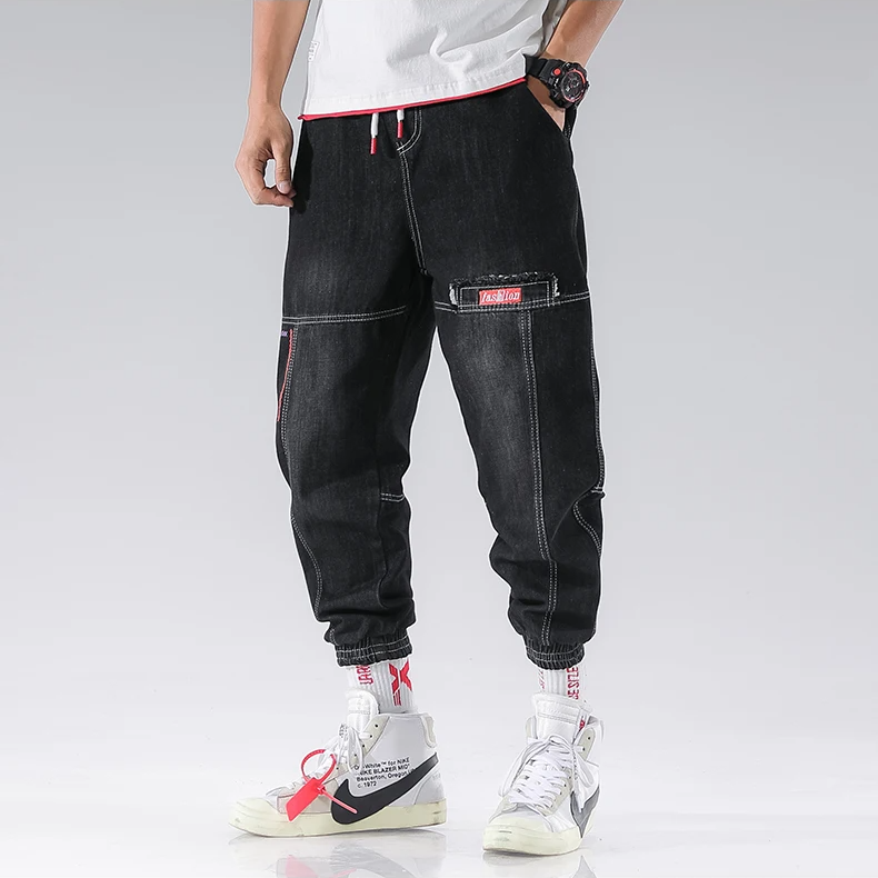 Elastic waist & drawstring on Men's Jacques Tapered Denim Joggers, ensuring a comfortable, relaxed fit.