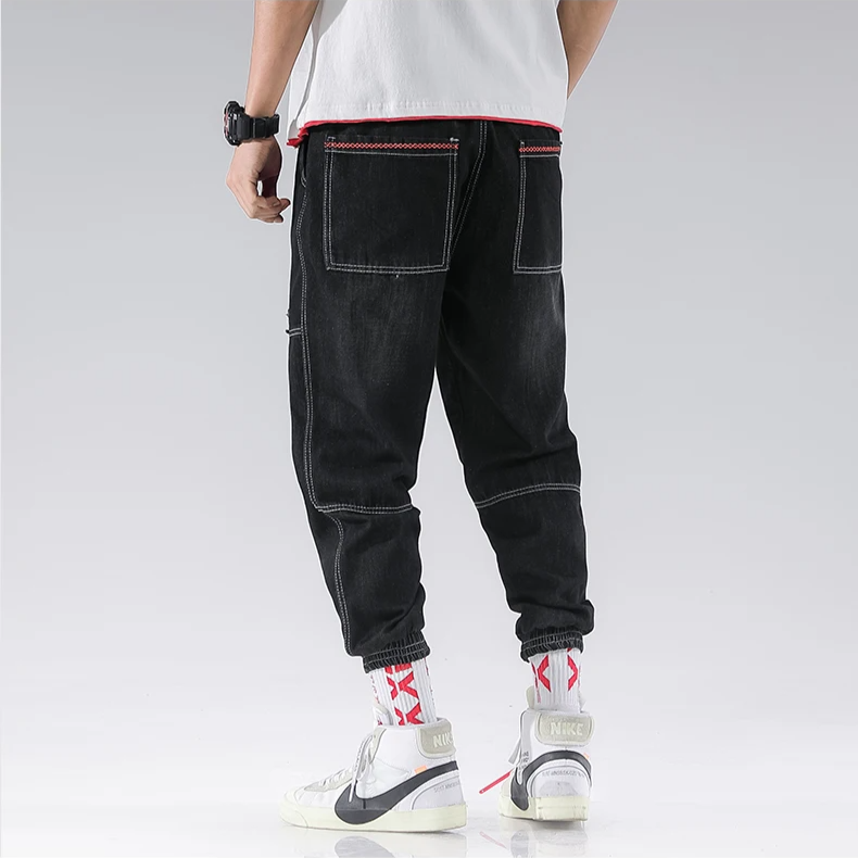 Back view of Men's Jacques Denim Joggers with functional pockets, great for versatile casual wear.