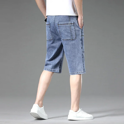 Dark blue men's utility denim shorts with practical multi-pockets, durable for everyday comfort.