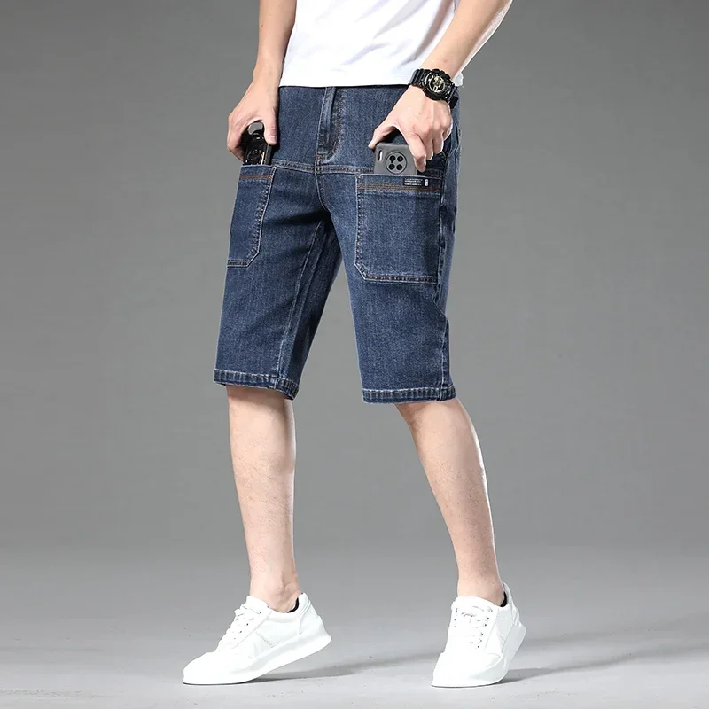 Durable men's Jefferson denim multi-pocket shorts, comfortable modern fit for practical everyday wear.