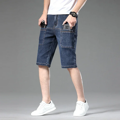 Durable men's Jefferson denim multi-pocket shorts, comfortable modern fit for practical everyday wear.