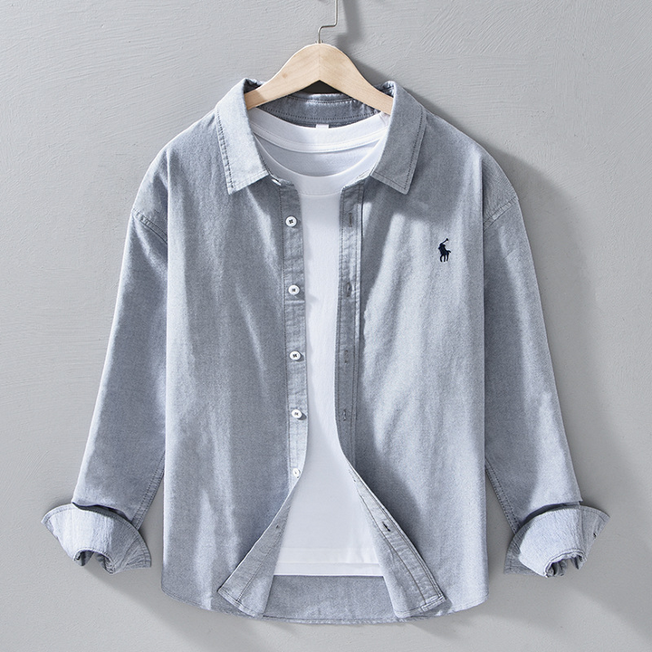 Tailored fit men's button-front shirt, the Julian features a classic design with a unique striped placket.