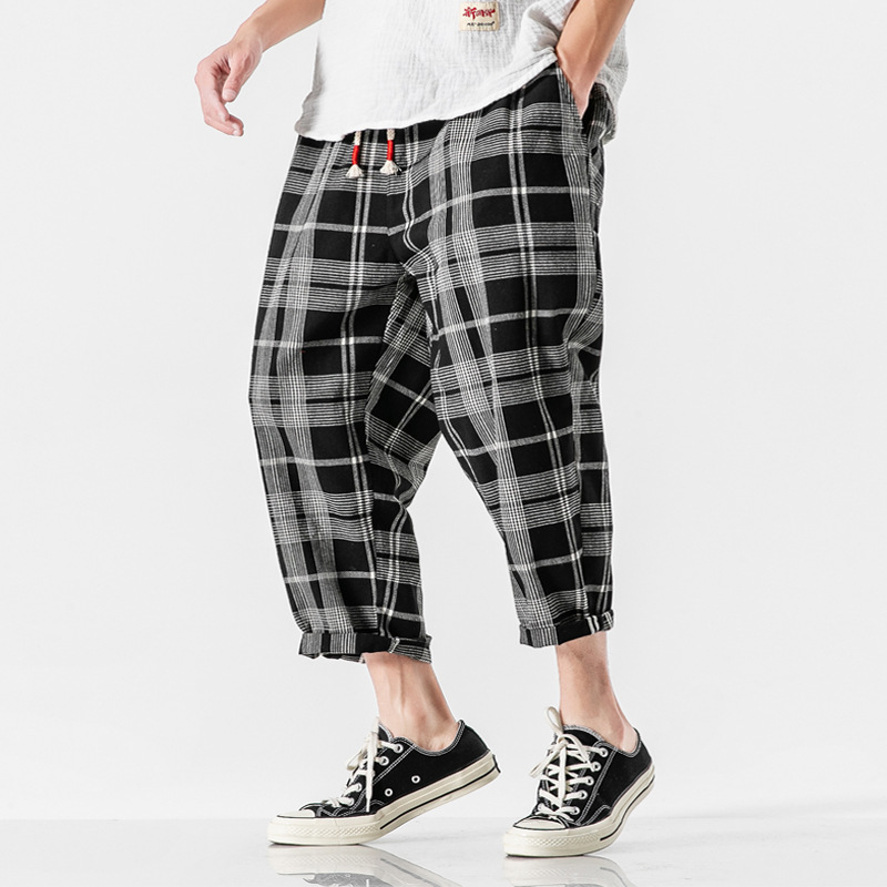 Men's Kaizen Grid Pants, relaxed fit, designed for fluid movement and everyday urban wear.