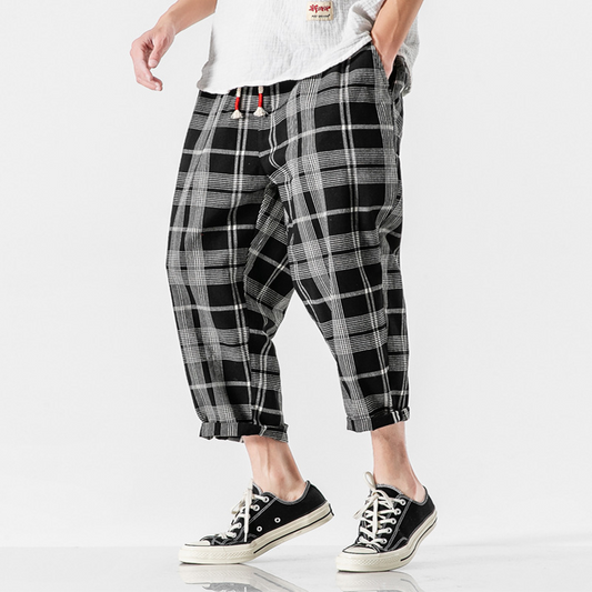 Men's Kaizen Grid Pants, relaxed fit, designed for fluid movement and everyday urban wear.