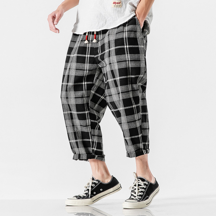 Men's Kaizen Grid Pants, relaxed fit, designed for fluid movement and everyday urban wear.