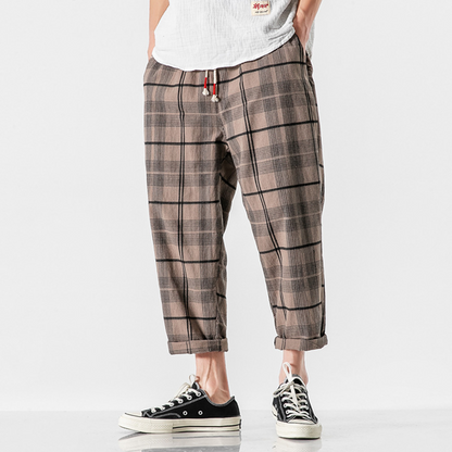 Comfortable men's Kaizen Grid Pants with drawstring, modern and urban style for relaxed everyday wear.