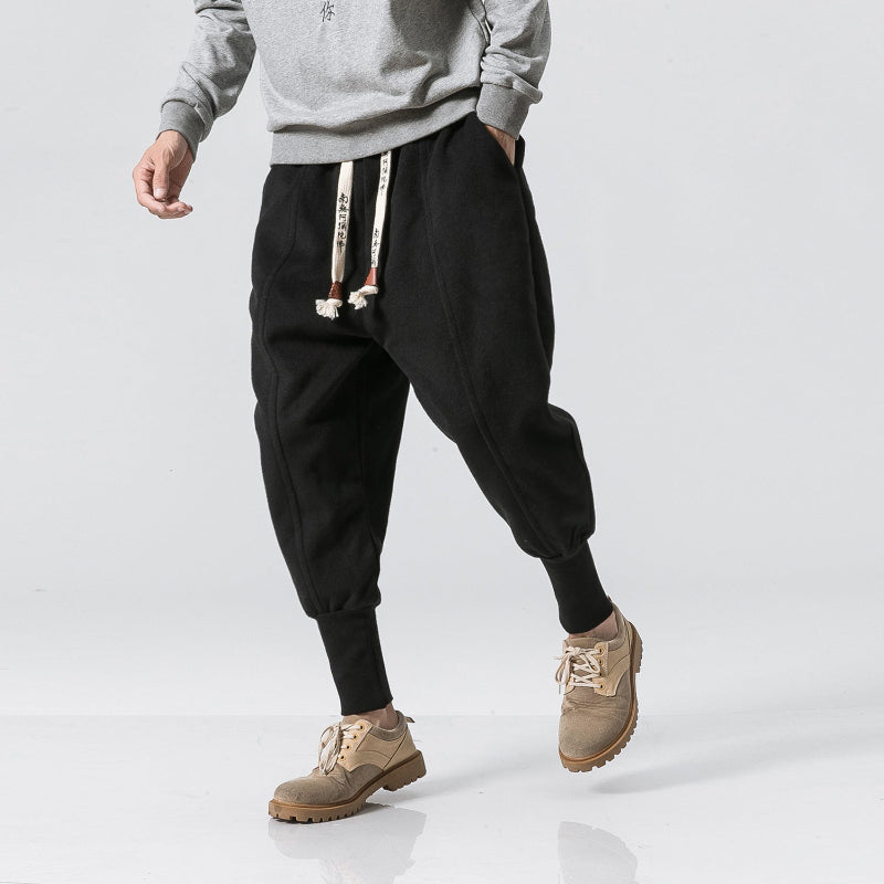 Versatile men's Katana relaxed fit tapered pants in gray, offering comfortable modern style for any occasion.