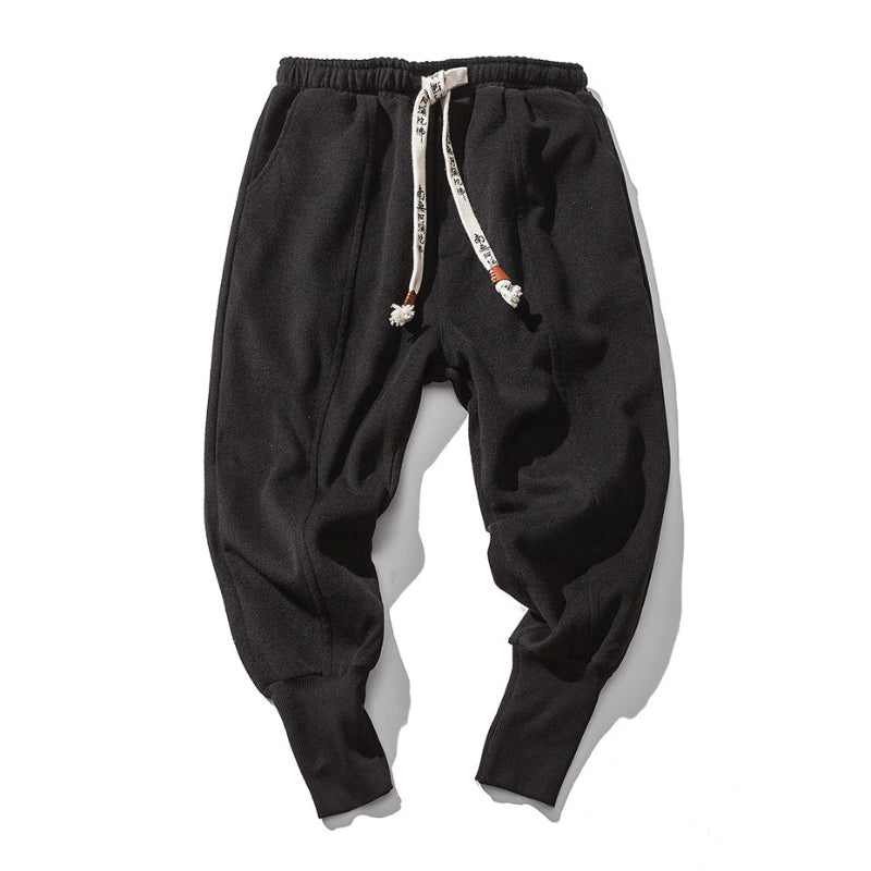 Stylish men's Katana relaxed fit tapered black pants, offering ultimate comfort for everyday and loungewear.