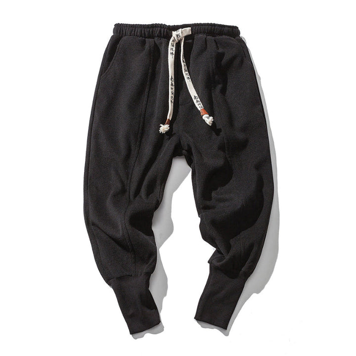 Stylish men's Katana relaxed fit tapered black pants, offering ultimate comfort for everyday and loungewear.