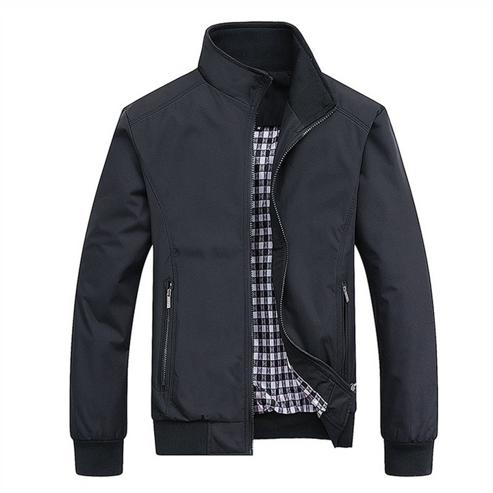 Contemporary men's bomber jacket offering a comfortable slim fit. A stylish and versatile outerwear essential.