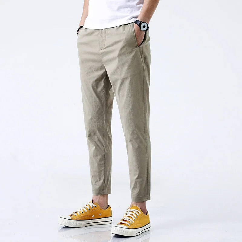 Black men's stretch cotton chinos, straight fit, ankle length casual pants offering maximum comfort.