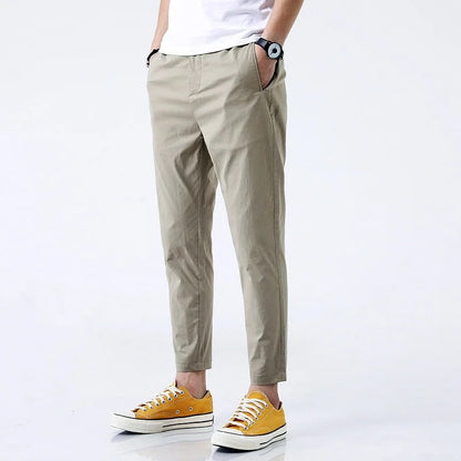 Black men's stretch cotton chinos, straight fit, ankle length casual pants offering maximum comfort.