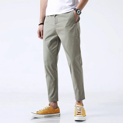 Men's casual stretch cotton trousers, straight fit, ensuring comfortable all-day wear with a modern look.