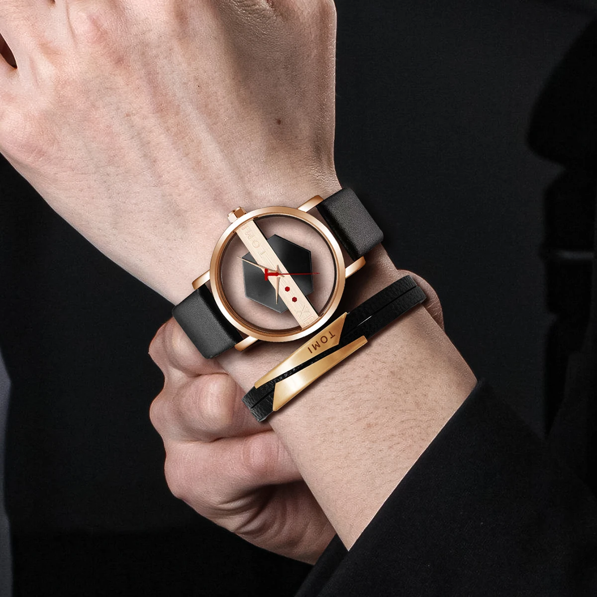 Frontal view of a men's Kinetic Orbit Watch, showcasing its distinctive orbit dial and polished stainless steel case.