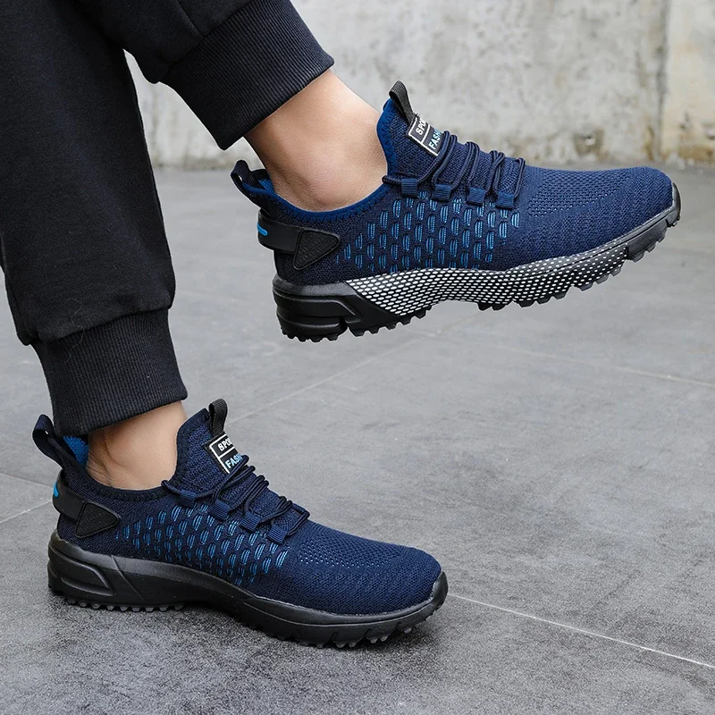 Breathable KinetiQ sport shoes for men, engineered for lightweight active performance and versatility.