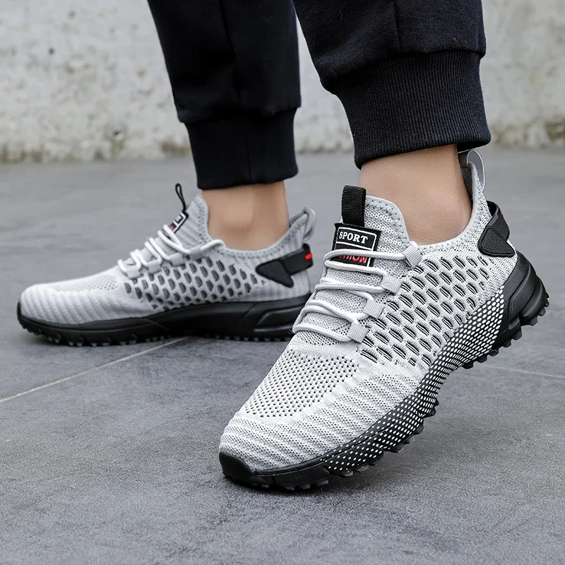 Versatile KinetiQ mesh athletic trainers for men, ideal for gym, running, and everyday comfort.