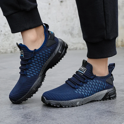 Lightweight KinetiQ men's footwear, mesh construction for ultimate breathability and support.