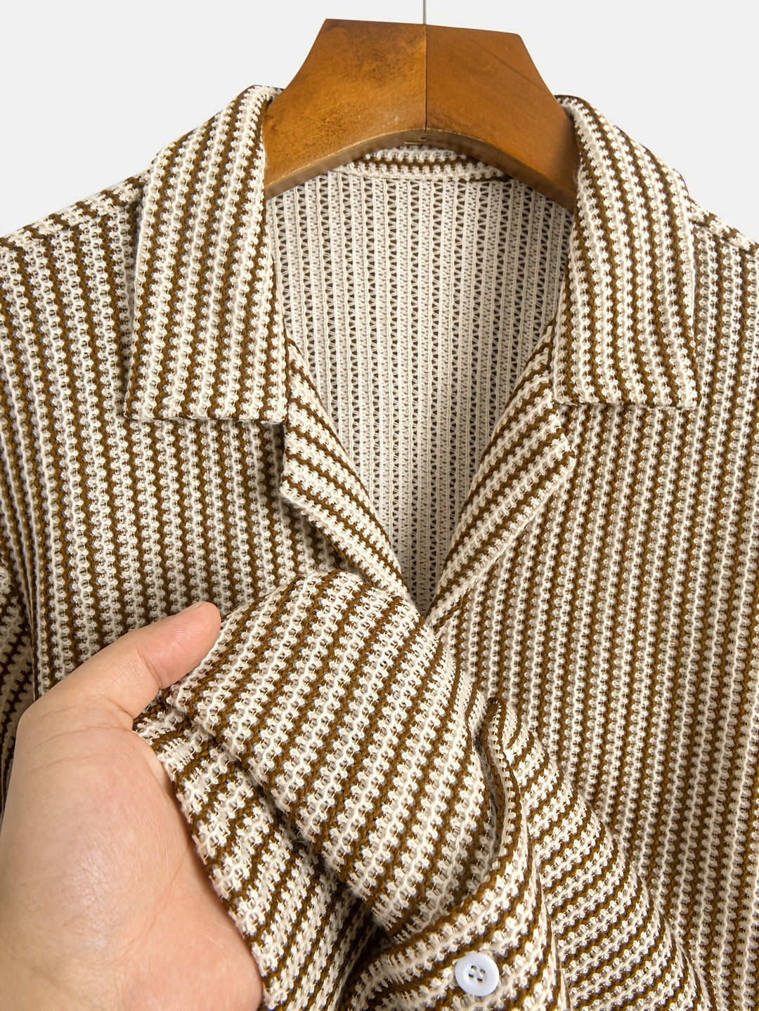 Stylish men's casual knit striped button-up shirt. Short sleeve, comfortable, versatile for summer fashion.