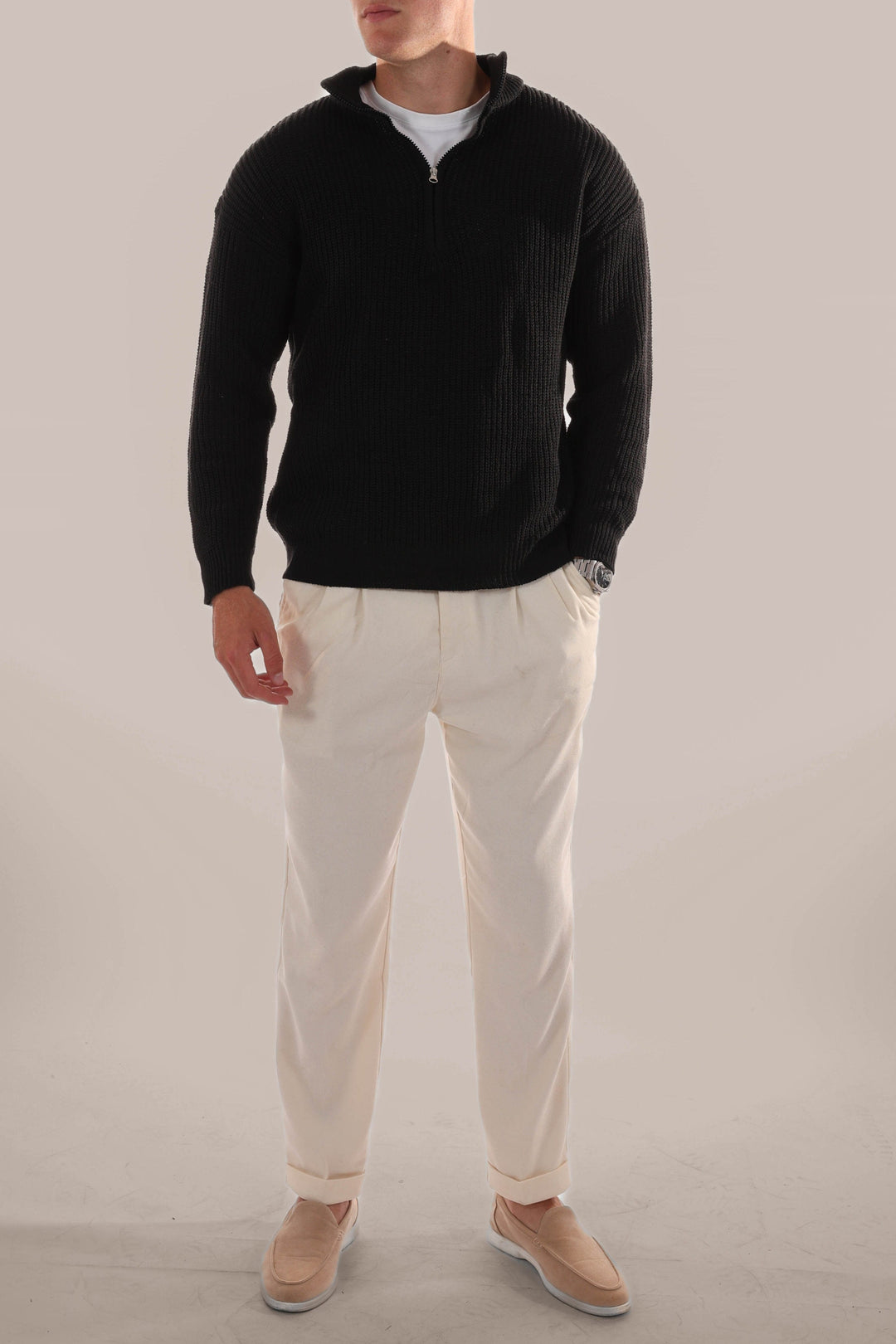Folded men's comfortable knitted half-zip jumper, ready for versatile everyday autumn and winter layering.