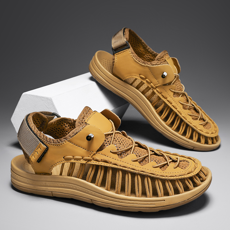 Men's Knox Ryder hiking sandals placed on a rock, ready for trail adventures & breathable outdoor wear.