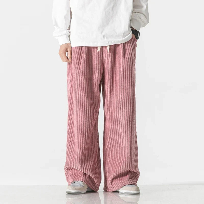 Men's relaxed fit straight leg trousers, embodying minimalist casual fashion with lasting comfort.