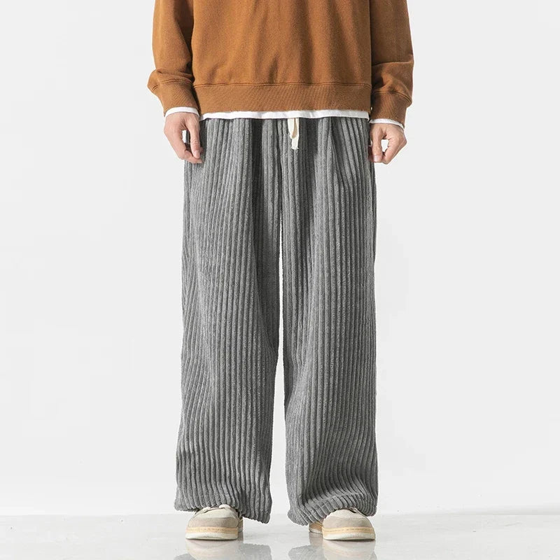 Classic men's bottoms: relaxed fit straight-leg pants, essential for versatile and comfortable styling.