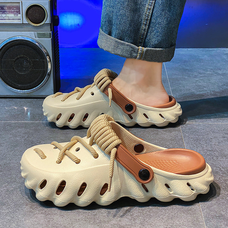 Water-friendly mens casual footwear: lightweight laced clogs with breathable design.