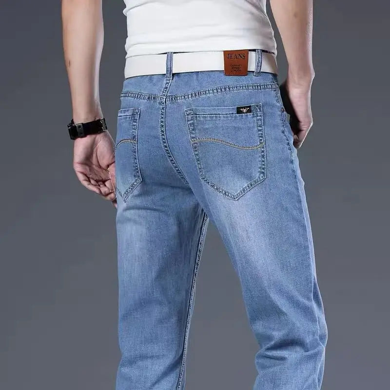 Back view of men's Langford classic blue stretch denim jeans, featuring signature pockets & straight leg cut.