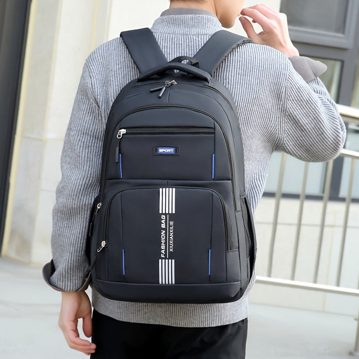 Men's large capacity travel backpack in black, perfect for daily adventures, work, or school.